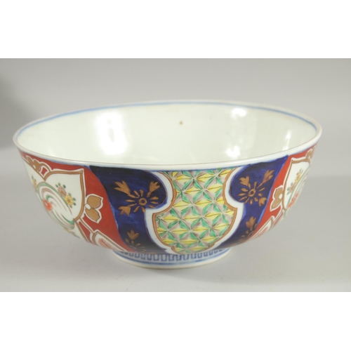 25 - A LARGE JAPANESE IMARI PORCELAIN BOWL, painted with various foliate motifs and gilt highlights, char... 