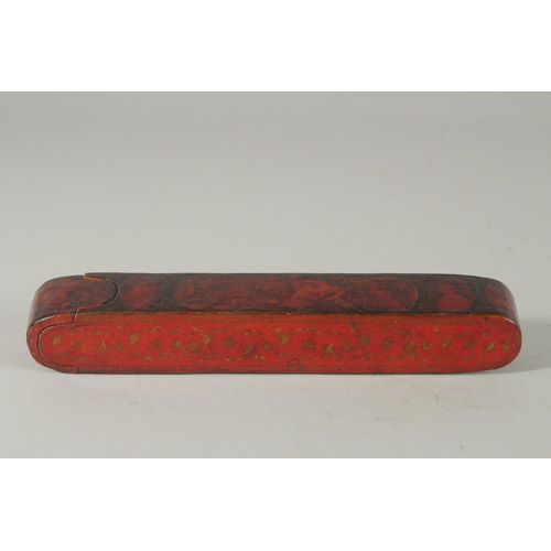 261 - A FINE 19TH CENTURY PERSIAN QAJAR LACQUERED PAPIER-MACHE QALAMDAN PEN BOX, 22.5cm long.