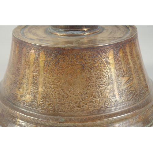 262 - A RARE LARGE 14TH-15TH CENTURY MAMLUK ENGRAVED BRASS CANDLESTICK BASE with later wooden top, engrave... 