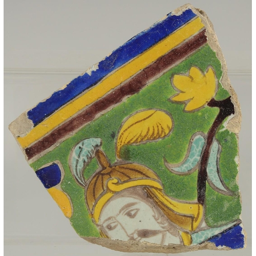 266 - TWO 17TH CENTURY PERSIAN SAFAVID CUERDA SECA TILE FRAGMENTS, 15cm x 13cm and 12.5cm x 13cm.