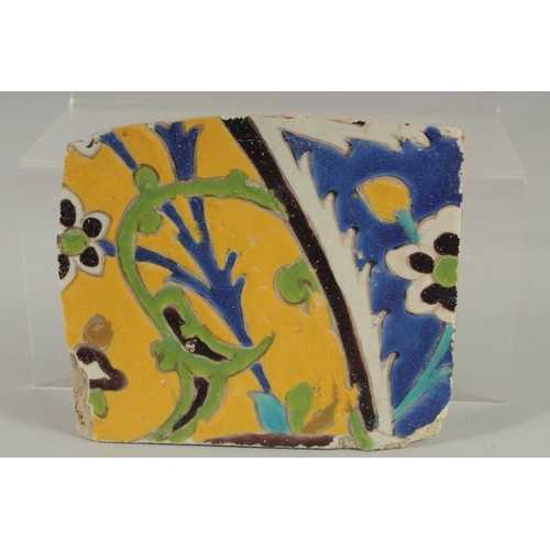 266 - TWO 17TH CENTURY PERSIAN SAFAVID CUERDA SECA TILE FRAGMENTS, 15cm x 13cm and 12.5cm x 13cm.