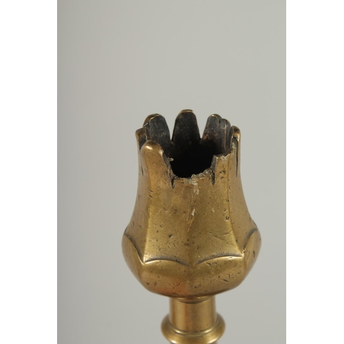 270 - A RARE 16TH-17TH CENTURY OTTOMAN TURKISH BRASS TULIP CANDLESTICK, 23cm high.