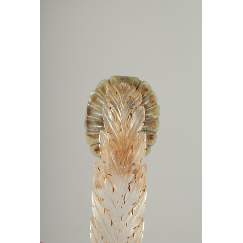 276 - A FINE INDIAN ROCK CRYSTAL AND JADE DAGGER HANDLE, 12.5cm long.