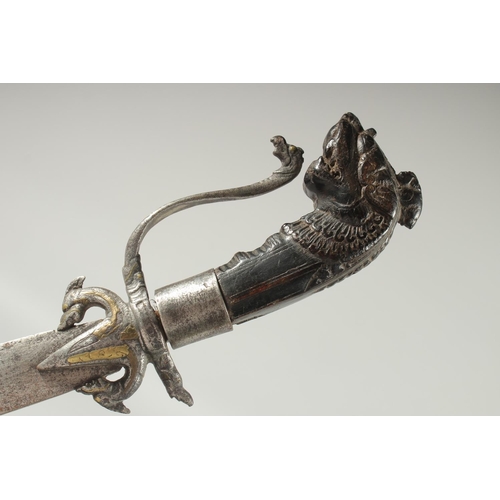 289 - A FINE 18TH CENTURY CEYLONESE SRI LANKAN KASTANE SWORD, with carved wooden handle and brass inlaid b... 