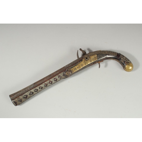 292 - AN OTTOMAN SILVER INLAID FLINTLOCK PISTOL, 43cm.