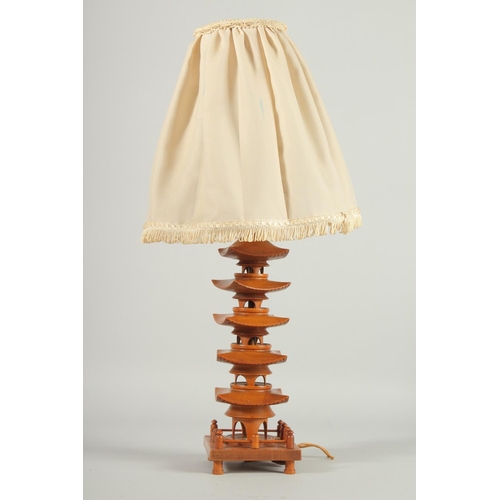 30 - A CHINESE CARVED BOXWOOD PAGODA FORM LAMP, with shade, 51cm high overall.