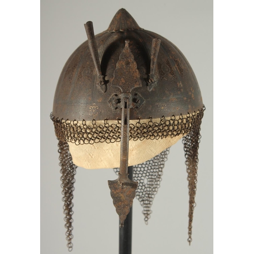 305 - A QAJAR GOLD DAMASCENED STEEL HELMET, with retractable nose guard and chain mail neck skirt, the int... 