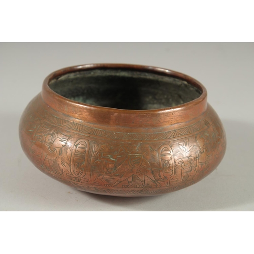 309 - AN EGYPTIAN ENGRAVED COPPER BOWL, 17cm diameter.