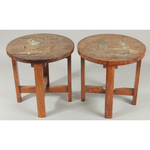 31 - A PAIR OF BONE INLAID WOODEN STOOLS, each depicting a female figure carrying a vessel of water, 30cm... 