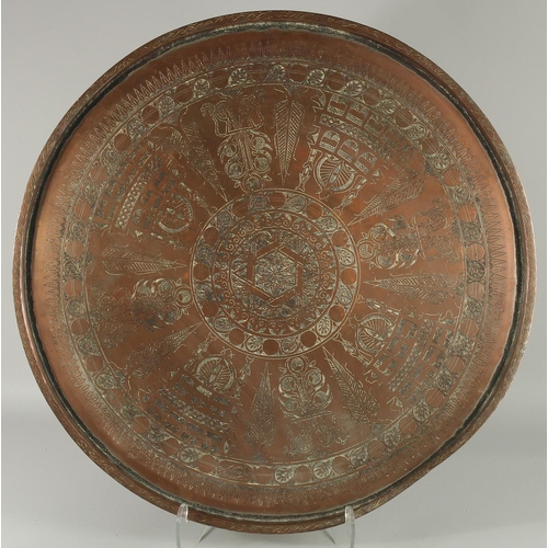 311 - A LARGE 18TH CENTURY OTTOMAN ENGRAVED COPPER TRAY, with Hebrew inscription, 69cm diameter.