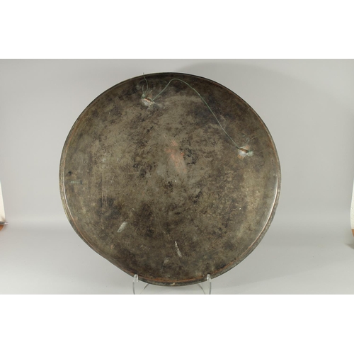 311 - A LARGE 18TH CENTURY OTTOMAN ENGRAVED COPPER TRAY, with Hebrew inscription, 69cm diameter.