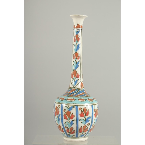 317 - A TURKISH KUTAHYA GLAZED POTTERY BOTTLE VASE, (neck repair), 30cm high.