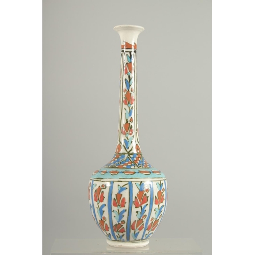 317 - A TURKISH KUTAHYA GLAZED POTTERY BOTTLE VASE, (neck repair), 30cm high.