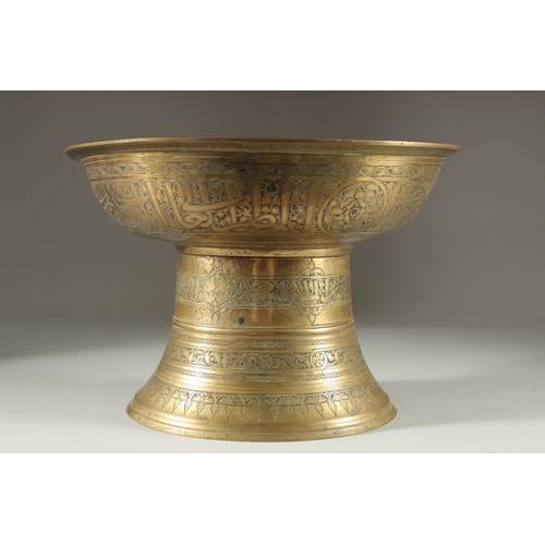 341 - A RARE EARLY ISLAMIC MAMLUK SILVER INLAID BRASS FOOTED BOWL / TRAY STAND, with engraved panels of ca... 