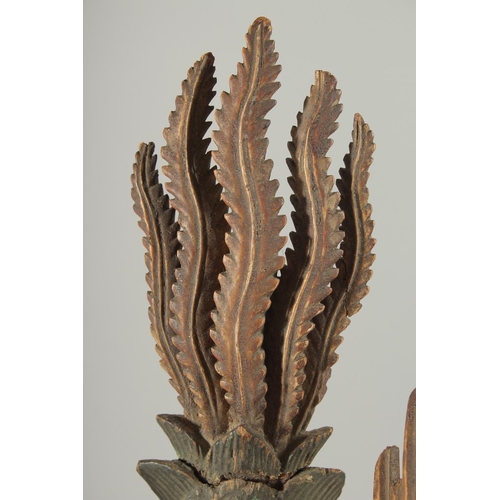 348 - AN 18TH-19TH CENTURY SOUTH EAST ASIAN LACQUERED CARVED WOODEN PHOENIX, possibly Thai, 30cm long.