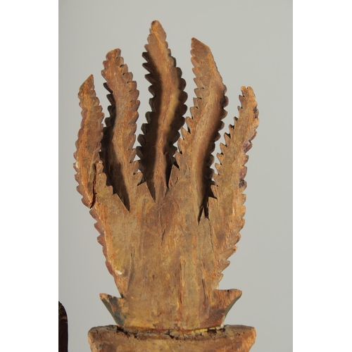 348 - AN 18TH-19TH CENTURY SOUTH EAST ASIAN LACQUERED CARVED WOODEN PHOENIX, possibly Thai, 30cm long.