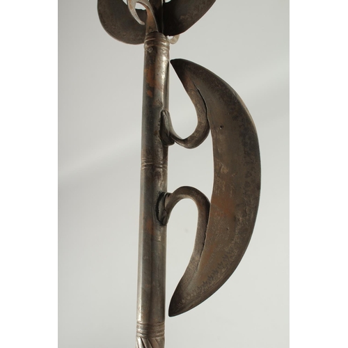 352 - AN UNUSUAL 19TH CENTURY NORTH INDIAN SILVER INLAID STEEL COMBINATION AXE, 85cm long.