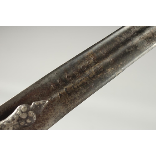 353 - A FINE 18TH CENTURY INDIAN TULWAR SWORD WITH SILVER INLAID HILT, sheathed within a leather overlaid ... 