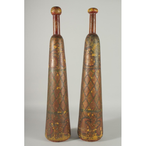 360 - A RARE PAIR OF 19TH CENTURY PERSIAN QAJAR LACQUERED WOODEN EXERCISE CLUBS, 62cm long.