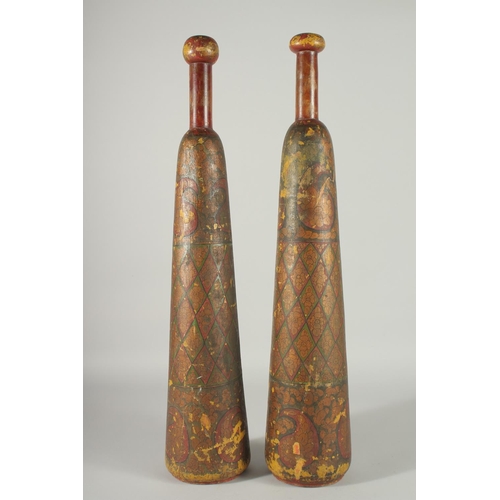 360 - A RARE PAIR OF 19TH CENTURY PERSIAN QAJAR LACQUERED WOODEN EXERCISE CLUBS, 62cm long.