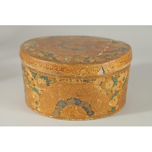 379 - AN INSCRIBED PAPIER MACHE CIRCULAR LIDDED BOX, (af), 20.5cm diameter.