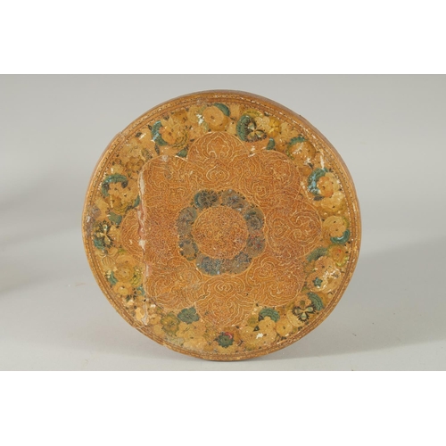 379 - AN INSCRIBED PAPIER MACHE CIRCULAR LIDDED BOX, (af), 20.5cm diameter.