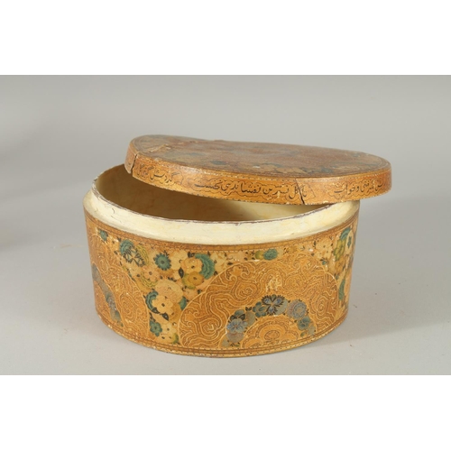 379 - AN INSCRIBED PAPIER MACHE CIRCULAR LIDDED BOX, (af), 20.5cm diameter.