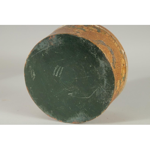 379 - AN INSCRIBED PAPIER MACHE CIRCULAR LIDDED BOX, (af), 20.5cm diameter.