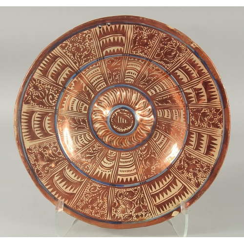 392 - A HISPANO-MORESQUE COPPER LUSTRE CHARGER, 37cm diameter.