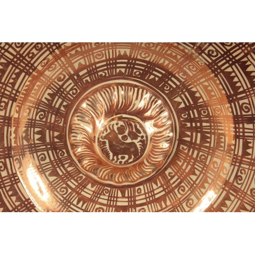 393 - A HISPANO-MORESQUE COPPER LUSTRE CHARGER, 37cm diameter.