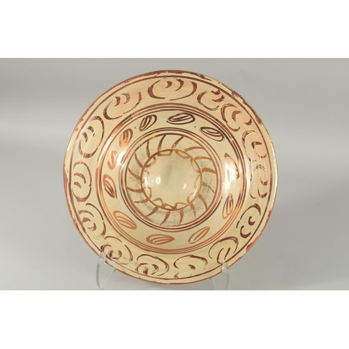 393 - A HISPANO-MORESQUE COPPER LUSTRE CHARGER, 37cm diameter.