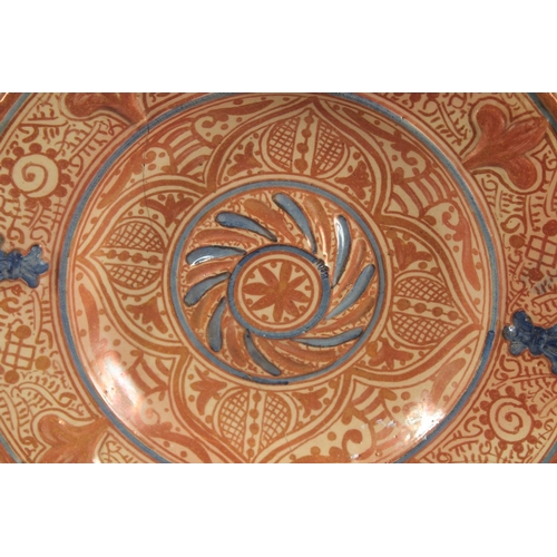 395 - A FINE 19TH CENTURY HISPANO-MORESQUE COPPER LUSTRE AND BLUE GLAZE PLATE, with various motifs and rai... 