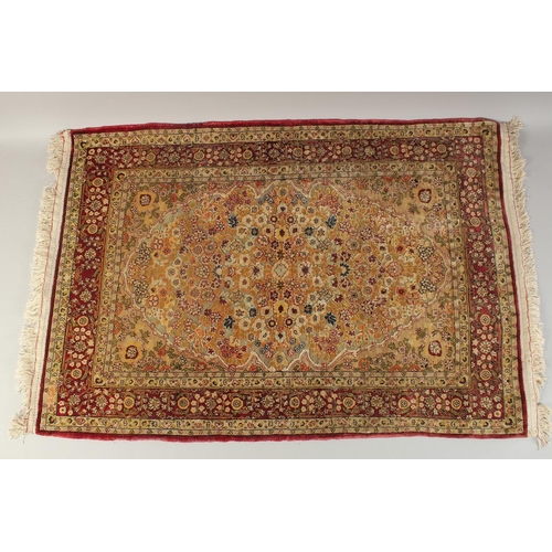 397 - A SILK AND METAL THREADED HEREKE RUG, 101cm x 69cm.