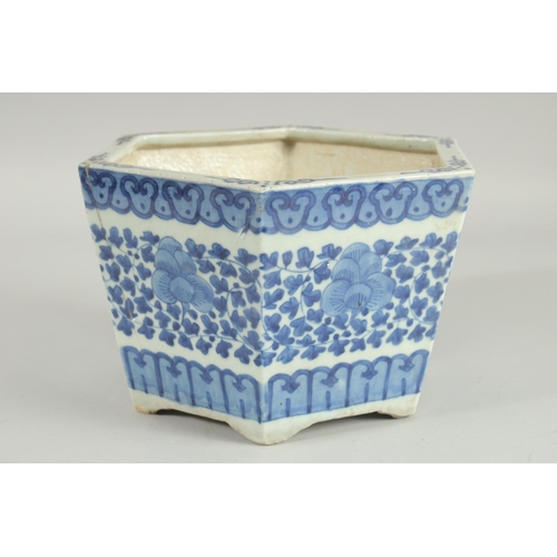 40 - A 19TH CENTURY CHINESE BLUE AND WHITE HEXAGONAL JARDINIERE, painted with foliate decoration, (one re... 