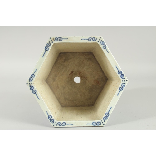 40 - A 19TH CENTURY CHINESE BLUE AND WHITE HEXAGONAL JARDINIERE, painted with foliate decoration, (one re... 