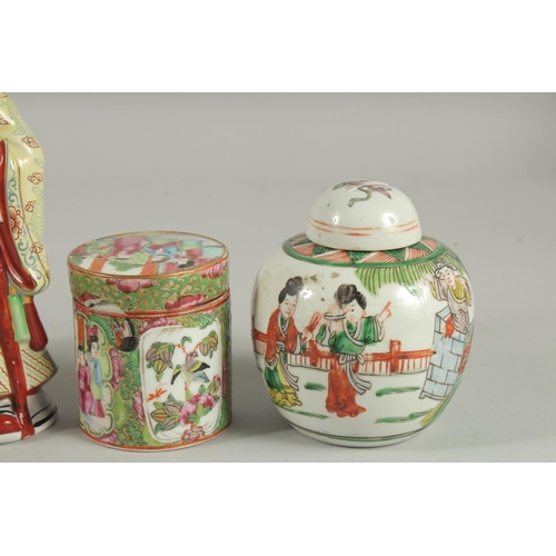 41 - FIVE CHINESE PORCELAIN ITEMS; including two Canton famille rose pots and covers, a figure of an immo... 