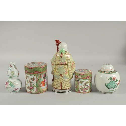 41 - FIVE CHINESE PORCELAIN ITEMS; including two Canton famille rose pots and covers, a figure of an immo... 