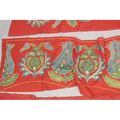 411 - A LARGE UZBEK EMBROIDERED TEXTILE SURROUND, (3 pieces).