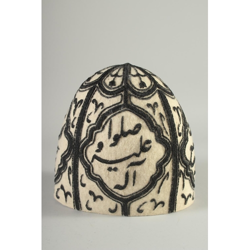 412 - A 20TH CENTURY EMBROIDERED DERVISH HAT.