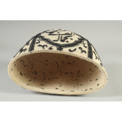 412 - A 20TH CENTURY EMBROIDERED DERVISH HAT.