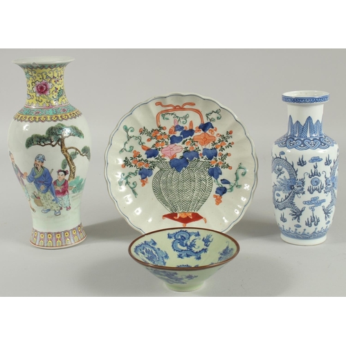 42 - FOUR ORIENTAL PORCELAIN ITEMS; including a famille rose vase, and Imari-type dish, a small celadon d... 