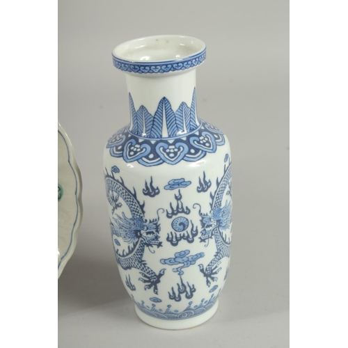 42 - FOUR ORIENTAL PORCELAIN ITEMS; including a famille rose vase, and Imari-type dish, a small celadon d... 