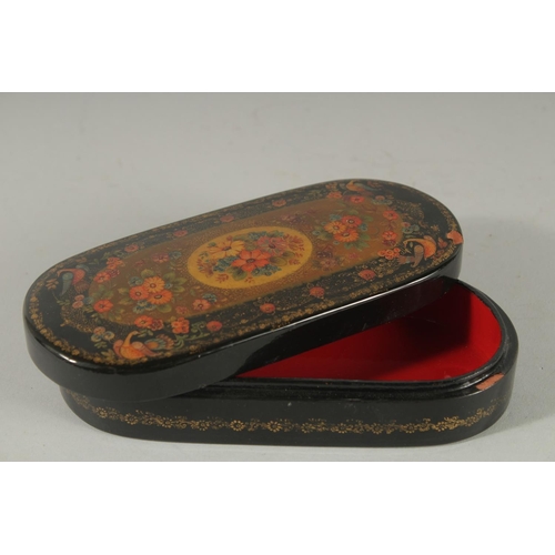 420 - A PERSIAN LACQUERED PEN CASE, 16.5cm long.