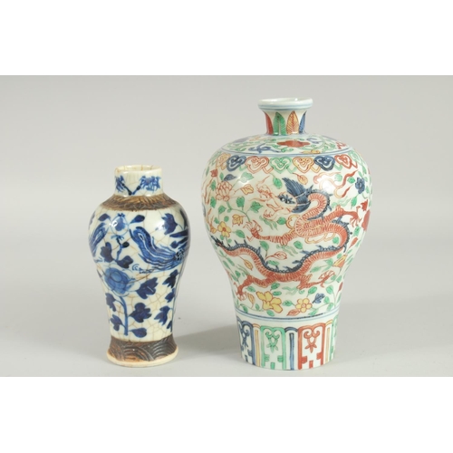 43 - TWO CHINESE PORCELAIN VASES; one 19th century blue and white phioenix vase, the other a wucai dragon... 