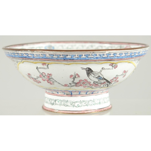 45 - A 19TH CENTURY CHINESE CANTON ENAMEL BOWL, painted with panels of birds and native flora, 13cm diame... 