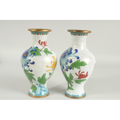 48 - A GOOD PAIR OF CHINESE CLOISONNE VASES, decorated with flora and butterfly with mixed enamels on whi... 