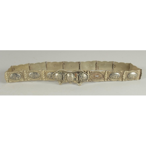 550 - AN OTTOMAN RUSSIAN ARMENIAN SILVER NIELLO BELT.