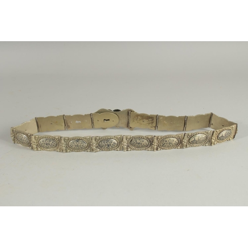 550 - AN OTTOMAN RUSSIAN ARMENIAN SILVER NIELLO BELT.