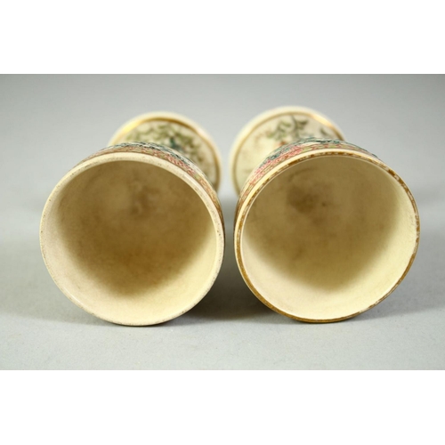 58 - A PAIR OF JAPANESE SATSUMA EGG CUPS, with foliate decoration, 6.5cm high.