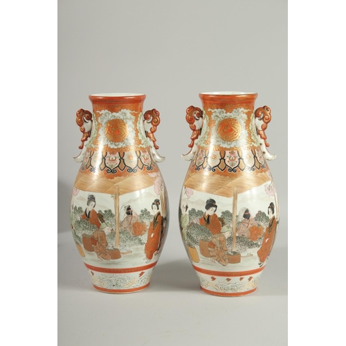 60 - A FINE PAIR OF JAPANESE KUTANI PORCELAIN TWIN HANDLE VASES, painted with a continuous scene depictin... 